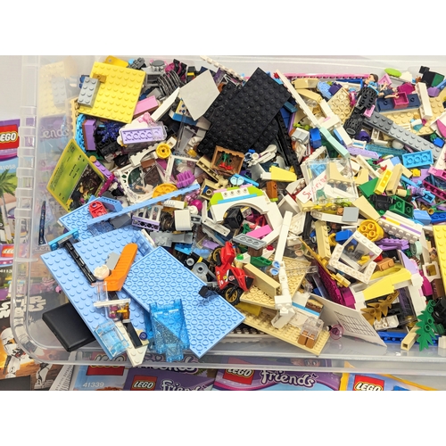 522 - A large collection of Lego with Lego manuals