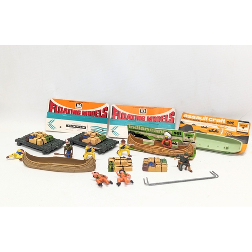 523 - A collection of vintage Britains Herald Floating models, cowboys and Indians.