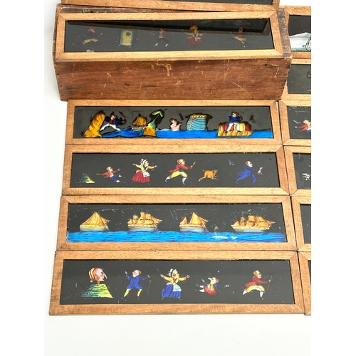 56 - A collection of late 19th/early 20th century Magic Lantern Slides. 33cm