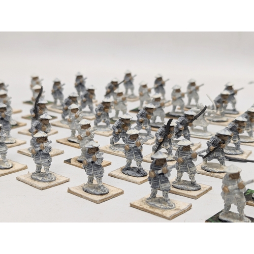 524 - A collection of metal model figures