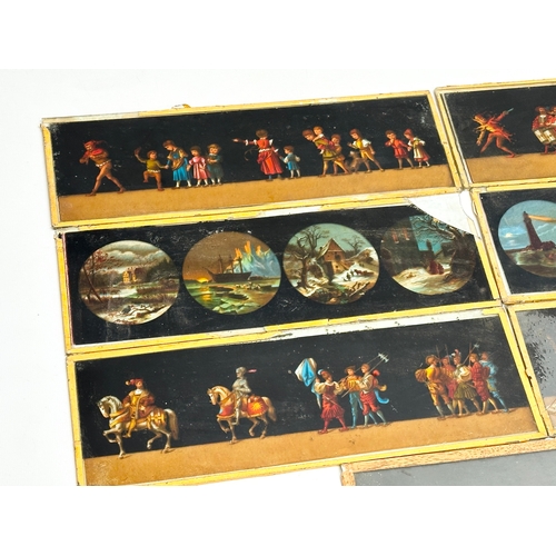 57 - A collection of late 19th/early 20th century Magic Lantern Slides. 30cm