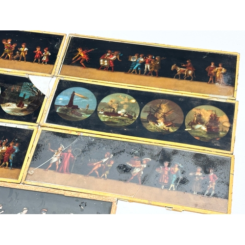 57 - A collection of late 19th/early 20th century Magic Lantern Slides. 30cm