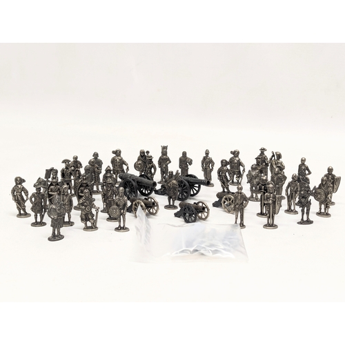 528 - A collection of metal model figures