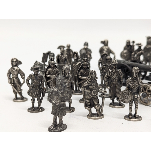 528 - A collection of metal model figures