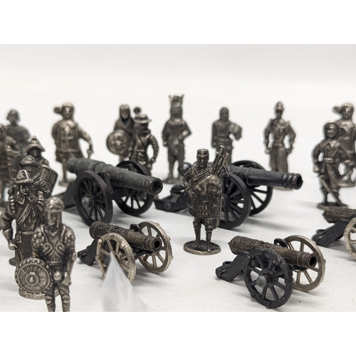 528 - A collection of metal model figures