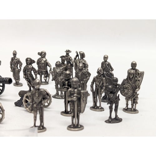 528 - A collection of metal model figures