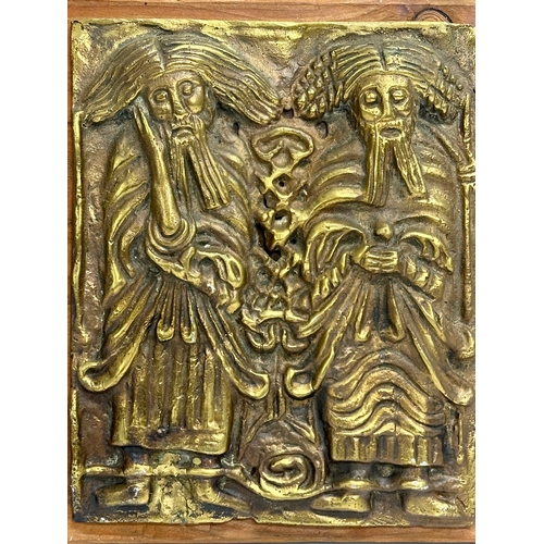 240 - An Irish Bronze religious wall plaque. Breach Maodhog. 16x20cm not including wood.