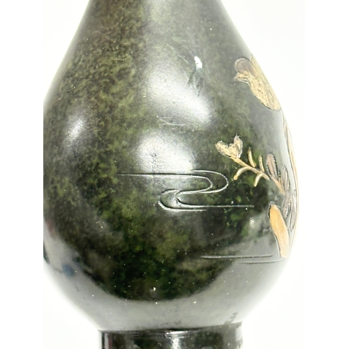 241 - 2 signed good quality late 19th century Japanese bronze vases. Decorated with Pagodas, Mountains, Bi... 