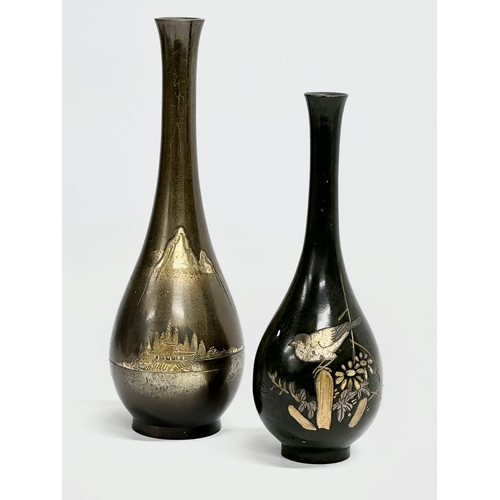 241 - 2 signed good quality late 19th century Japanese bronze vases. Decorated with Pagodas, Mountains, Bi... 