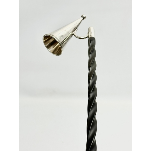 469 - A Victorian silver plated Baleen candle snuffer. 71cm