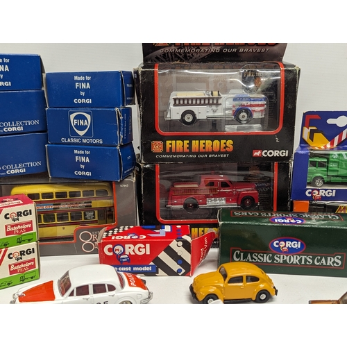 532 - A collection of model cars and trucks by Corgi, including The Showcase Collection 'Fire Heroes,' Cam... 