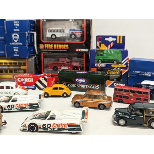 532 - A collection of model cars and trucks by Corgi, including The Showcase Collection 'Fire Heroes,' Cam... 