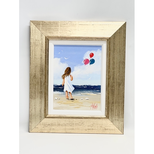 269 - An oil painting on board by Michelle Carlin. Balloon on the Beach. 21x29cm. Frame 43x50.5cm C