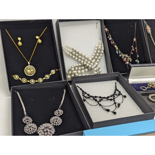 607 - A collection of costume jewellery including necklaces, bracelets, earrings, etc.