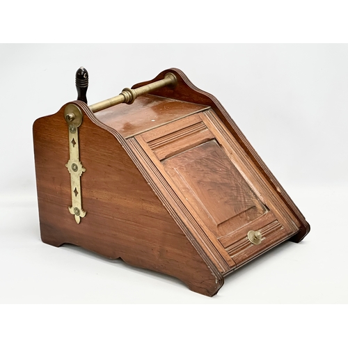 279 - An Edwardian Walnut coal scuttle. 38x53x36cm