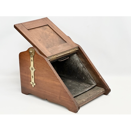 279 - An Edwardian Walnut coal scuttle. 38x53x36cm