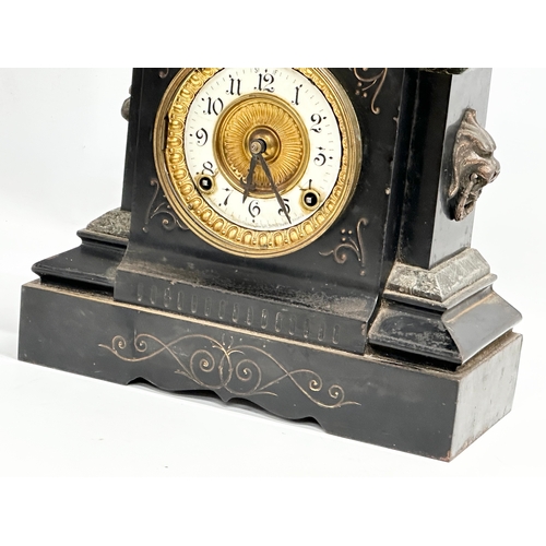 479 - A late 19th century American slate, marble and brass mantle clock. Ansonia Clock Co. With key and pe... 