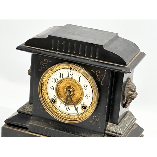 479 - A late 19th century American slate, marble and brass mantle clock. Ansonia Clock Co. With key and pe... 