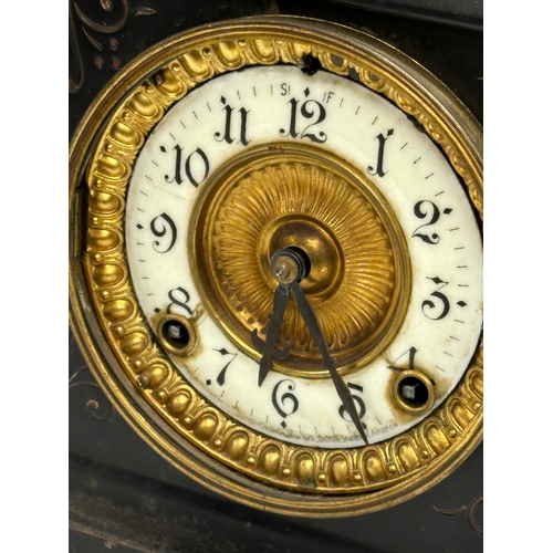 479 - A late 19th century American slate, marble and brass mantle clock. Ansonia Clock Co. With key and pe... 