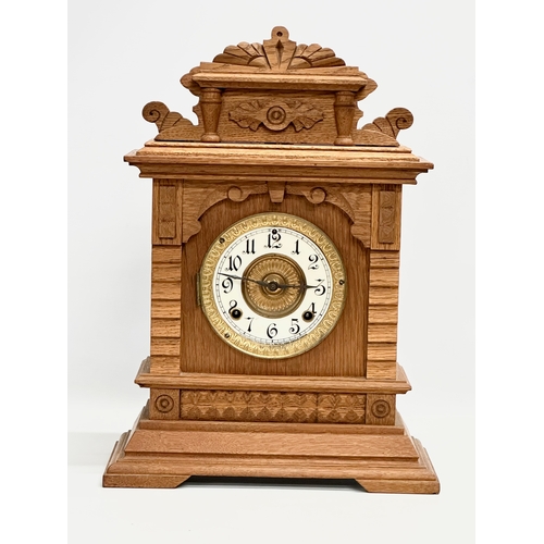 483 - A large late 19th century American oak mantle clock. Ansonia Clock Co. Eight Day Syria Strike. Circa... 