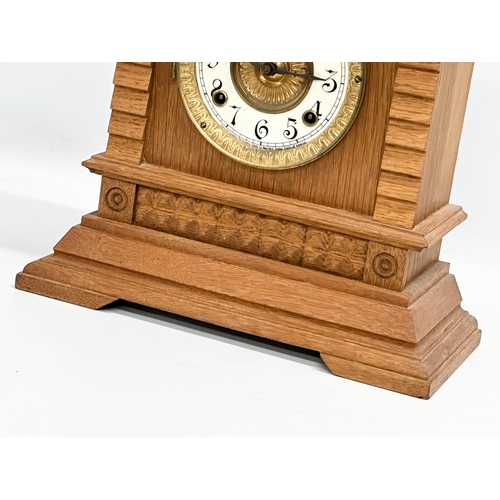 483 - A large late 19th century American oak mantle clock. Ansonia Clock Co. Eight Day Syria Strike. Circa... 