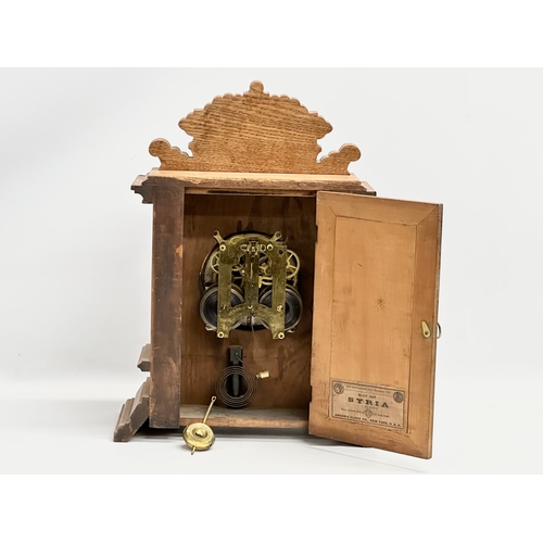 483 - A large late 19th century American oak mantle clock. Ansonia Clock Co. Eight Day Syria Strike. Circa... 