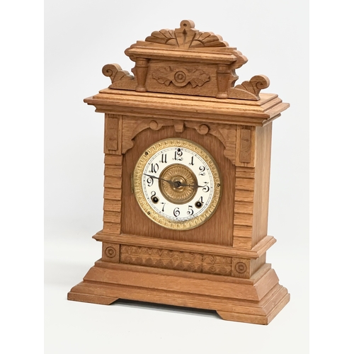 483 - A large late 19th century American oak mantle clock. Ansonia Clock Co. Eight Day Syria Strike. Circa... 