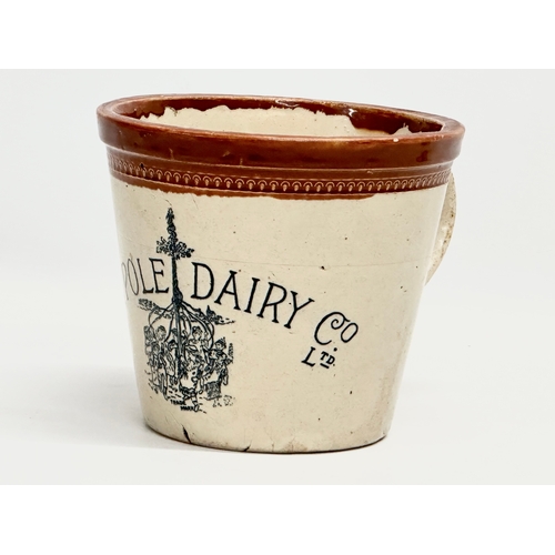 403 - A late 19th century Maypole Dairy Co LTD butter crock with handle. 17x22x15cm