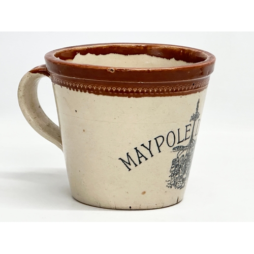 403 - A late 19th century Maypole Dairy Co LTD butter crock with handle. 17x22x15cm