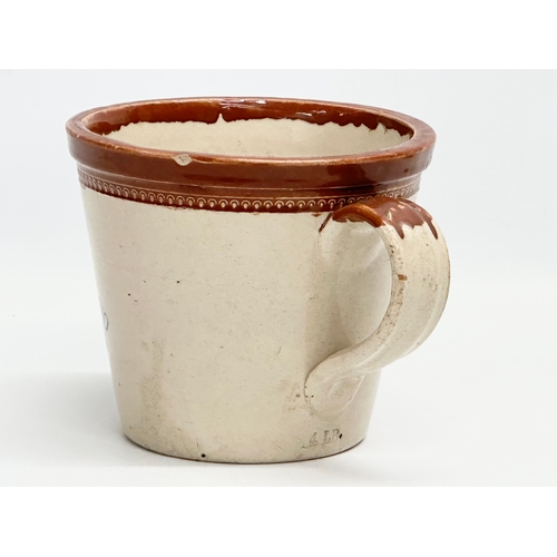 403 - A late 19th century Maypole Dairy Co LTD butter crock with handle. 17x22x15cm