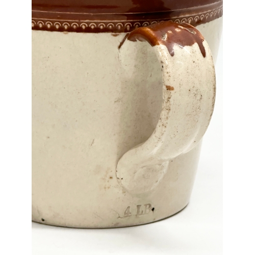 403 - A late 19th century Maypole Dairy Co LTD butter crock with handle. 17x22x15cm