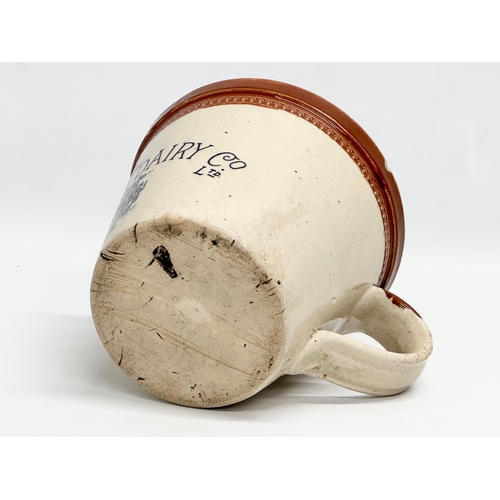 403 - A late 19th century Maypole Dairy Co LTD butter crock with handle. 17x22x15cm