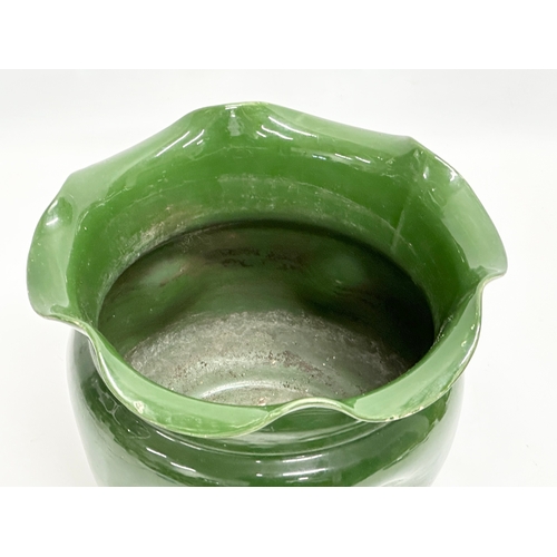 489 - An early 20th century English green glazed pottery jardiniere with frilled. Circa 1890-1910. 27.5x21... 