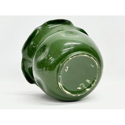 489 - An early 20th century English green glazed pottery jardiniere with frilled. Circa 1890-1910. 27.5x21... 