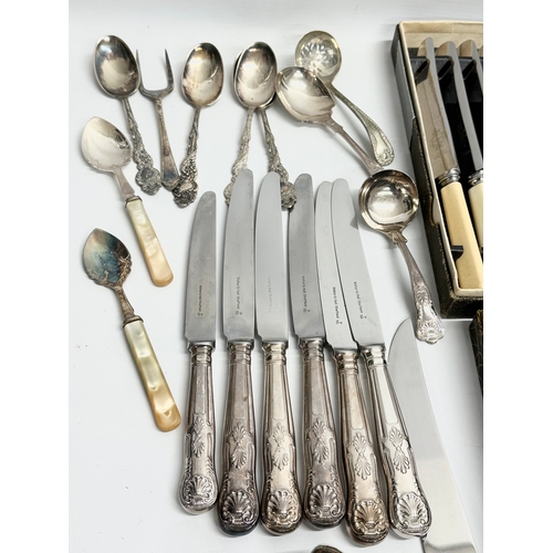 492 - A large collection of 19th and early 20th century silver plated cutlery.