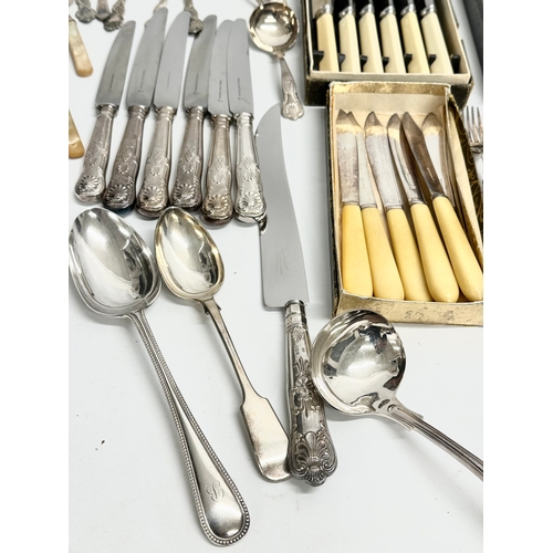 492 - A large collection of 19th and early 20th century silver plated cutlery.