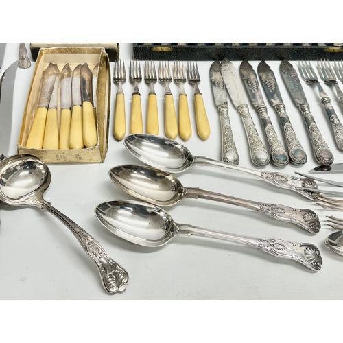 492 - A large collection of 19th and early 20th century silver plated cutlery.