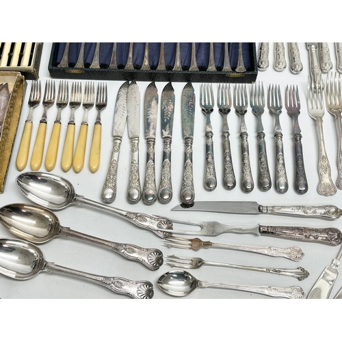 492 - A large collection of 19th and early 20th century silver plated cutlery.