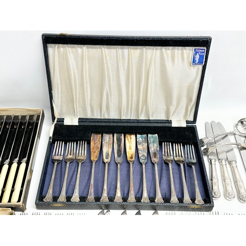 492 - A large collection of 19th and early 20th century silver plated cutlery.