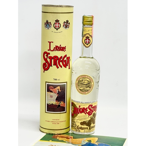 454 - A bottle of 1950’s Liquore Strega with advertising poster and case.