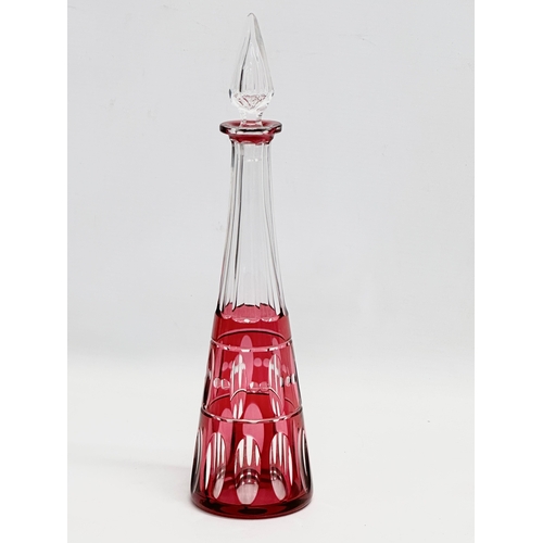 245 - A rare 1930’s etched Ruby Glass drinks set by Louie Wohinc. Weston Glass. Decanter 31.5cm. Stemmed p... 