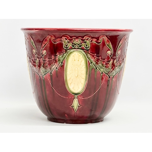 285 - A large late 19th century Majolica jardiniere. 31x26cm