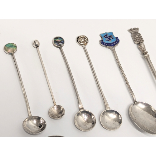 553 - A collection of silver spoons. Including an Isle Of Man silver spoon by Walker & Hall, Birmingham 19... 