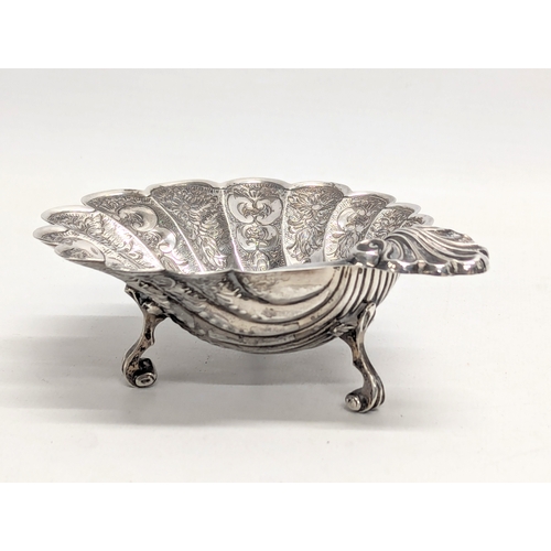 556 - A large mid 20th century ornate silver bon bon dish by S. J. Rose. Birmingham. Circa 1950s-1970s. 11... 