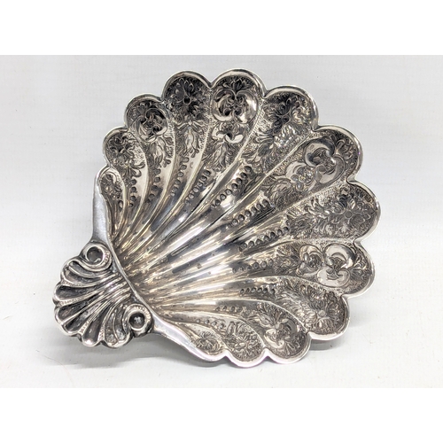 556 - A large mid 20th century ornate silver bon bon dish by S. J. Rose. Birmingham. Circa 1950s-1970s. 11... 