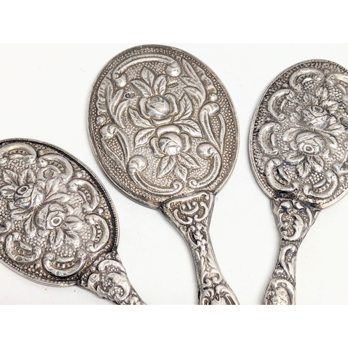 559 - A set of 3 ornate silver vanity mirrors. Turkish, 1923-1939. Largest measures 17.5cm