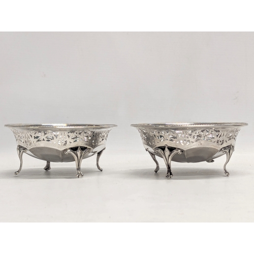 565 - A pair of early 20th century pierced silver footed dishes by Sydney & Co. Birmingham, 1916. 245.16g.... 