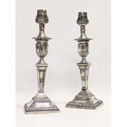 566 - A pair of late 19th century sterling silver converted candlesticks / lamps by Thomas Wilkes Barker. ... 