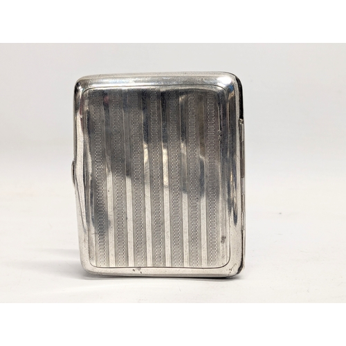 568 - A early 20th century silver cigarette case by William Neale & Sons Ltd. Birmingham, 1913. 99.3g. 7x8... 