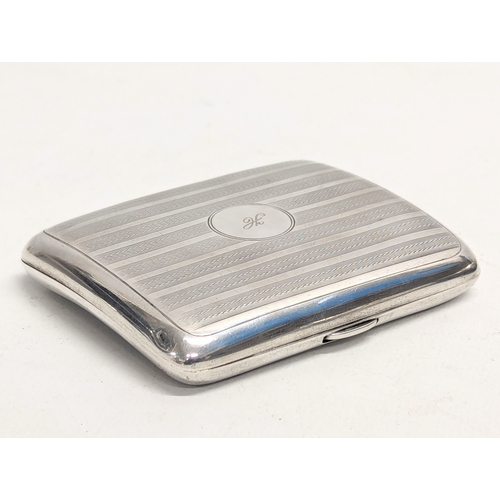 568 - A early 20th century silver cigarette case by William Neale & Sons Ltd. Birmingham, 1913. 99.3g. 7x8... 